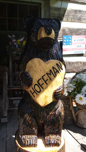 Chainsaw Carved Bear with a heart