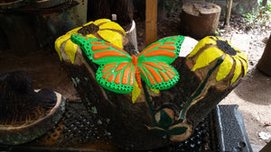Chainsaw and Hand carved butterfly