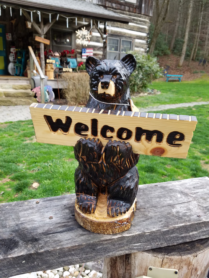 Bear Holding a sign